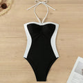 Women's black and white one-piece swimsuit with pearl spaghetti straps for swimming