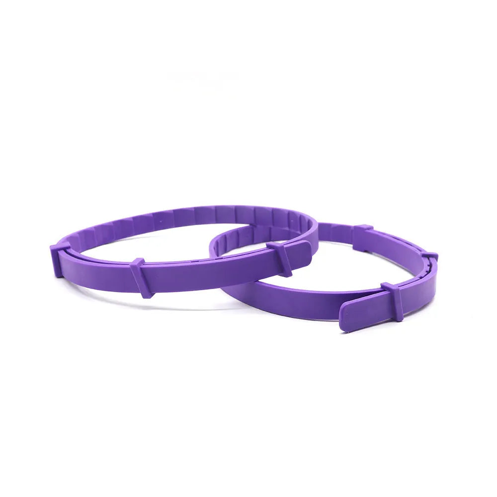 Four dog anxiety relief collars in different colours with Chinese-style patterns and adjustable clasps