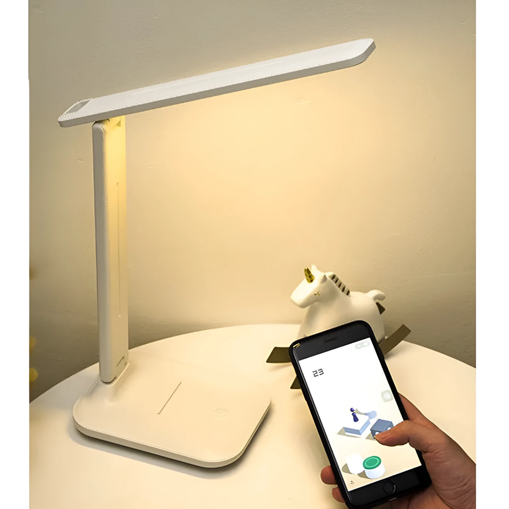 White plastic bedside lamp with touch dimming controls for children's bedrooms