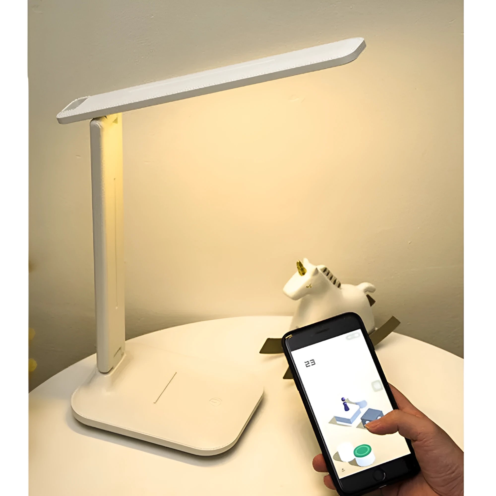 White plastic bedside lamp with touch dimming controls for children's bedrooms