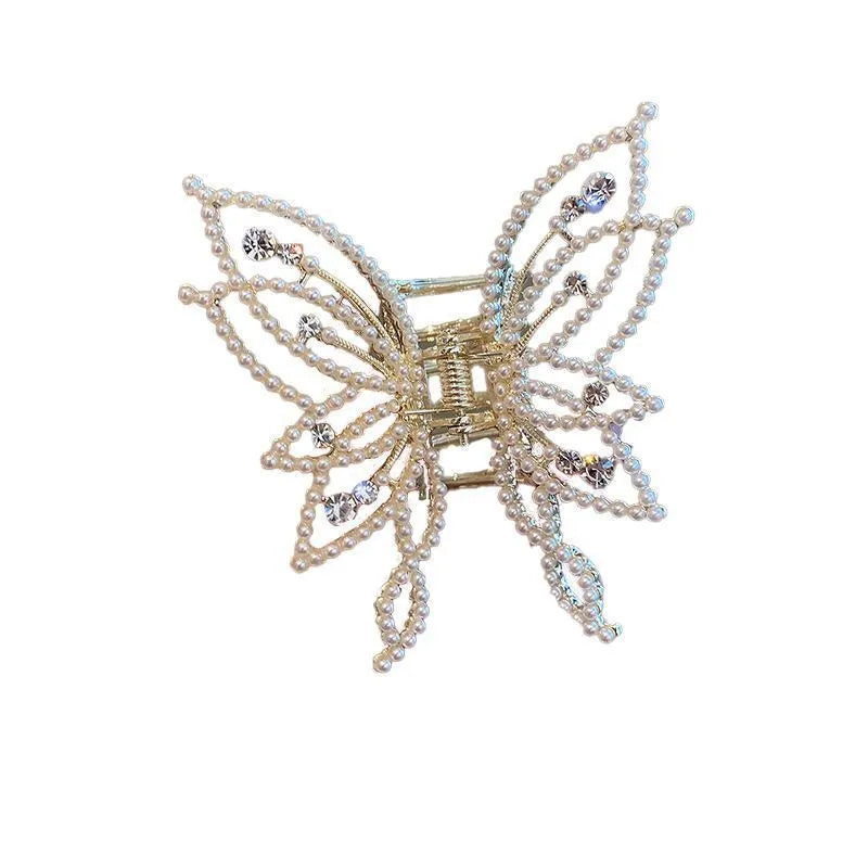 Butterfly-shaped hair barrettes for women with alloy construction and decorative rhinestone or pearl styling