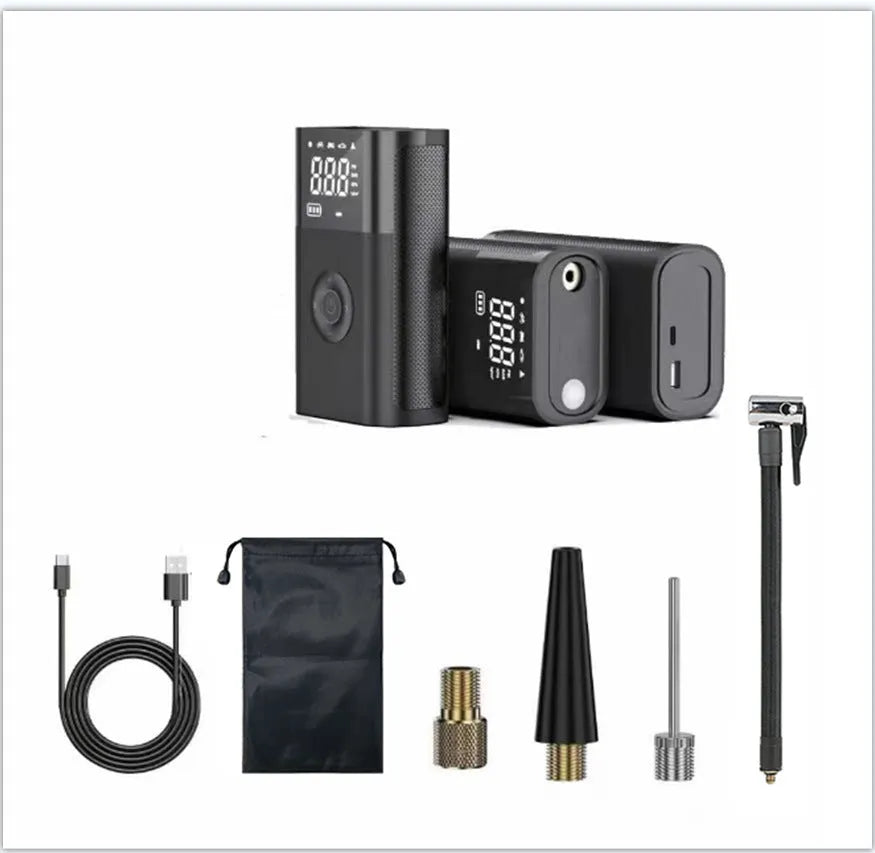 T2191-2 handheld wireless digital display air pump with LED light and multiple nozzle attachments on a table.