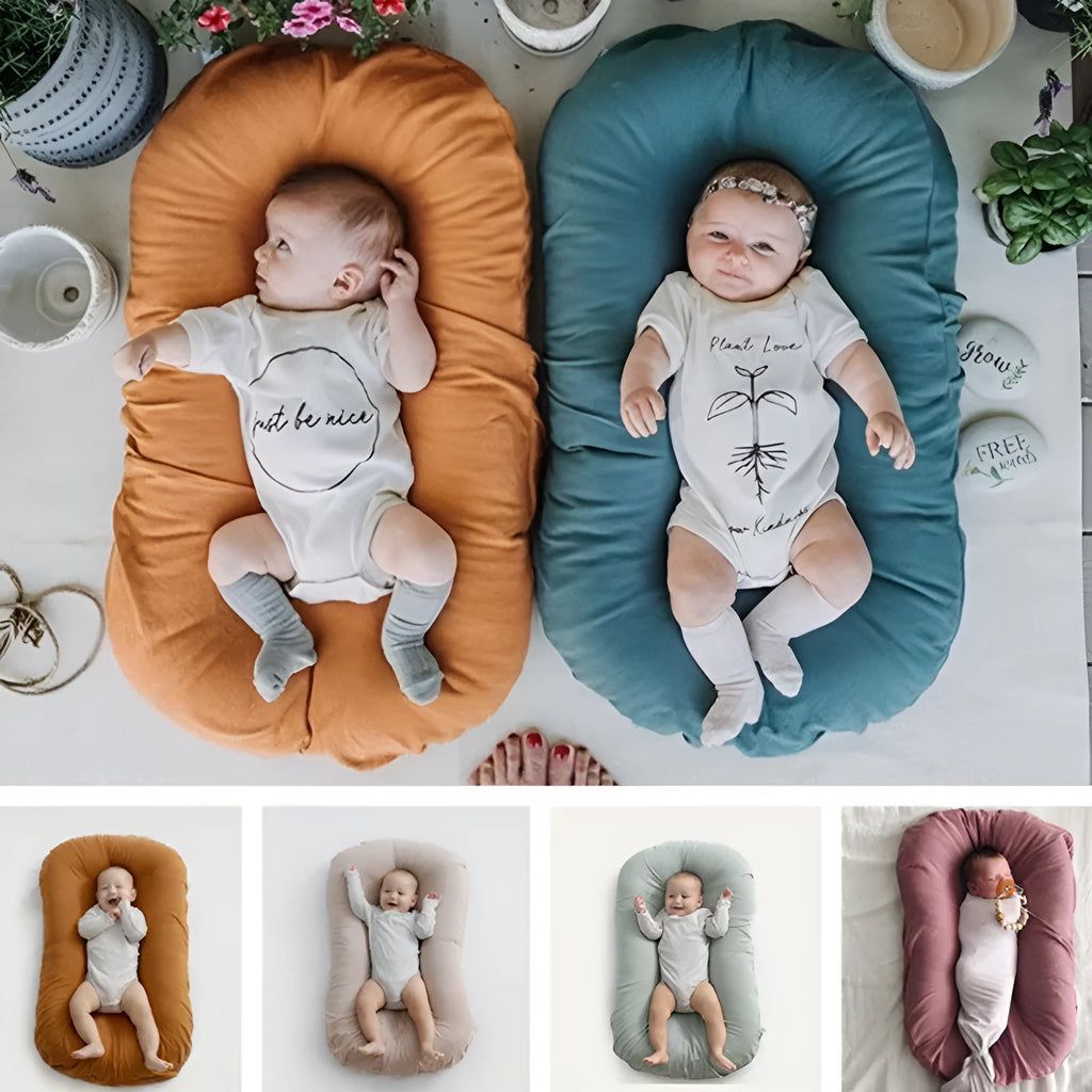 Portable baby nest crib measuring 75x45cm in cotton fabric with PP cotton filler