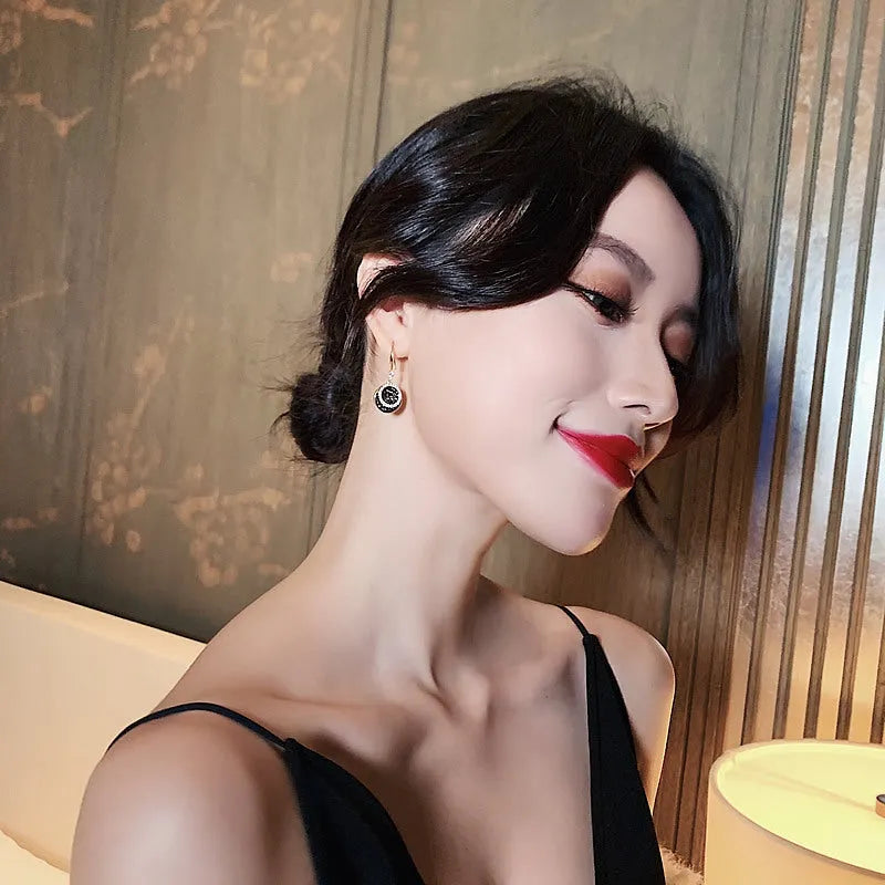 Black retro geometric drop earrings with 3.6cm round pieces and Hong Kong style design