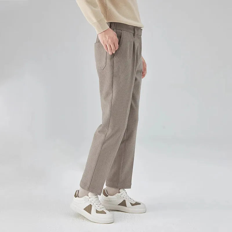 Men's beige straight-leg corduroy trousers with a loose fit and mid-waist design