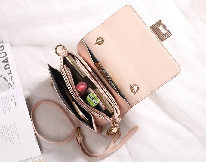 Women's small square sequined PU handbag with lock closure and adjustable shoulder strap in pink, wathet, and black colours 22x16x9cm