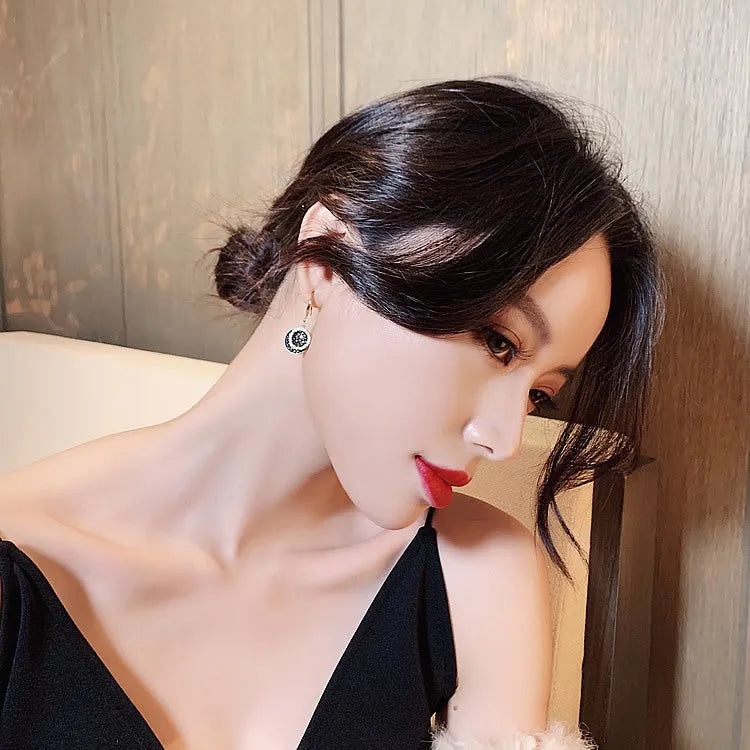 Black retro geometric drop earrings with 3.6cm round pieces and Hong Kong style design