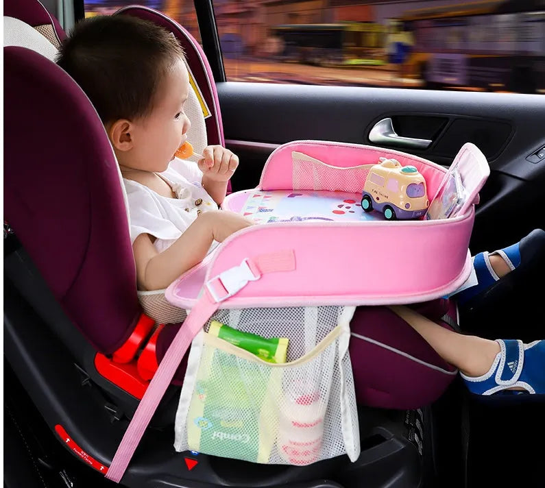 Baby car seat tray table in blue Oxford fabric and polyester, 42x32x8 cm, on a car seat