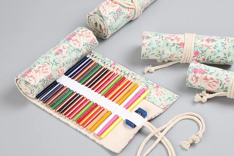 Canvas pencil wrap with multiple elastic bands rolled up showing slot configuration