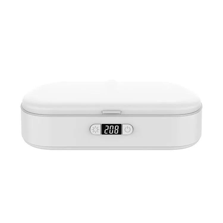 White ultraviolet steriliser box with wireless charging for mobile phones and small items.