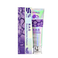 100g tube of white oral care toothpaste with peppermint leaf extract on a bathroom counter