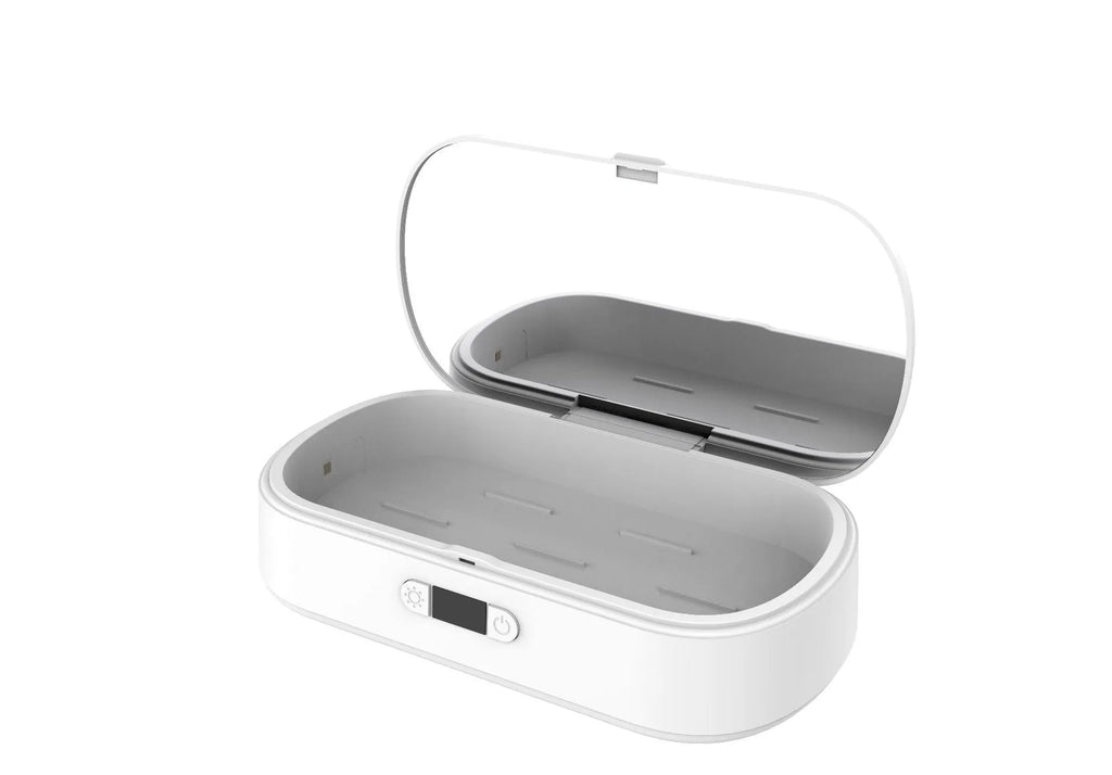 White ultraviolet steriliser box with wireless charging for mobile phones and small items.