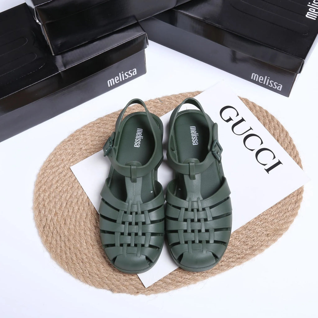 Matte black Roman sandals with vintage weave pattern and buckle fastening
