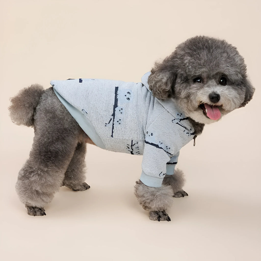 Blue and pink dog sweater with zipper front closure in cotton material showing pattern details
