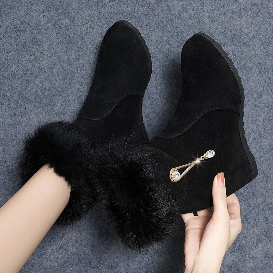 Black height increasing insole snow boots for women with fur integration upper and casual design