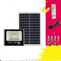 Black solar-powered LED flood light for outdoor garden and street lighting with remote control.