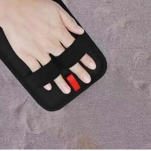 Black EVA pet hair removal brush for cleaning fur from fabric surfaces