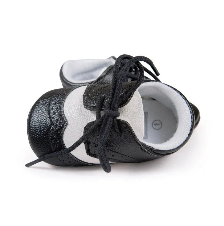 Vintage style baby soft sole walking shoes in synthetic leather available in multiple colours
