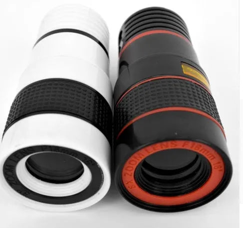 12X magnification black phone telescope lens with mounting clip extended next to a smartphone.