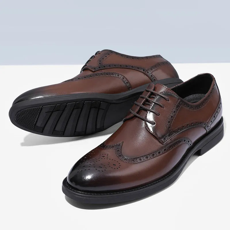 Men's black and brown brogue business shoes with classic detailing, shown from the side.