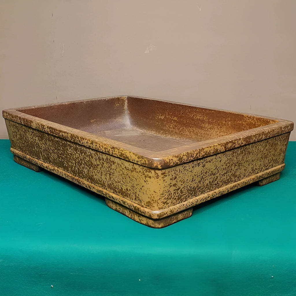 Straight shallow rectangular Yixing Zisha flowerpot made of purple sand clay.