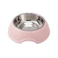 Blue stainless steel pet bowl with a non-slip black base on a kitchen floor.