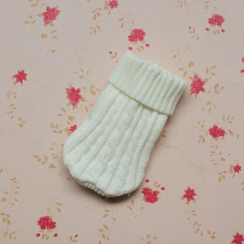 Knitted wool dog sweater in eight colours with fabric buttons for small to large dogs