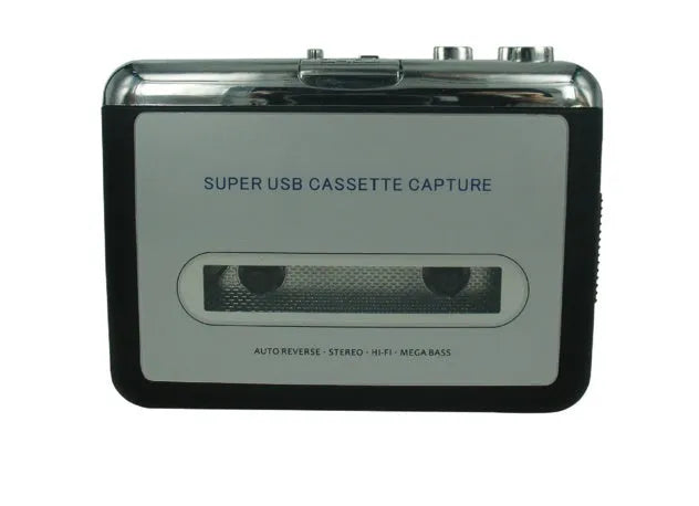 Compact black cassette to MP3 converter with USB cable on a desk next to a cassette tape.