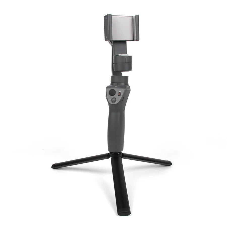Black aluminium alloy mobile phone tripod and handheld stabiliser with telescopic legs extended.