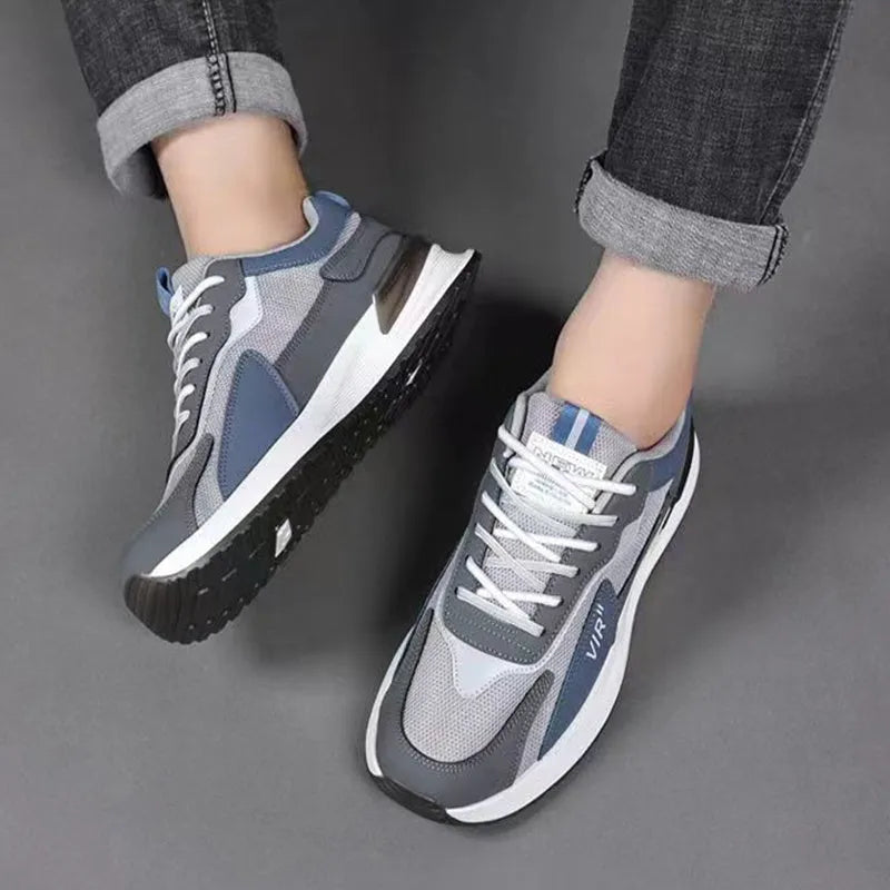 Men's colour block mesh casual running shoes in black, flat heel and round toe design.
