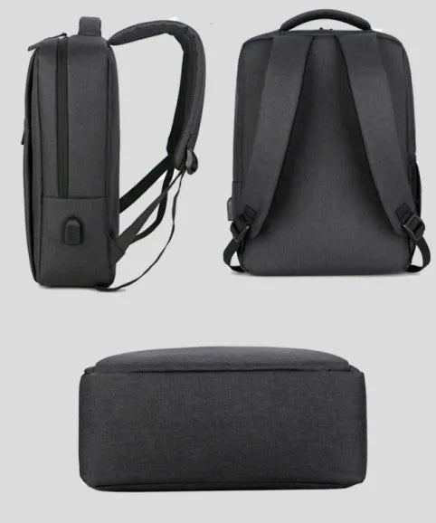 Black waterproof Oxford cloth laptop backpack with shoulder straps, shown with a laptop and charging cable.