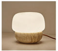 Cream retro bedside lamp with button switch on wooden surface
