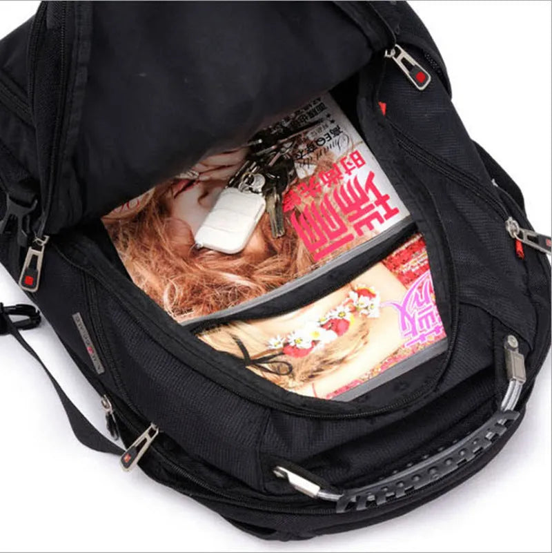 Black business backpack open to show laptop compartment and internal organisers.