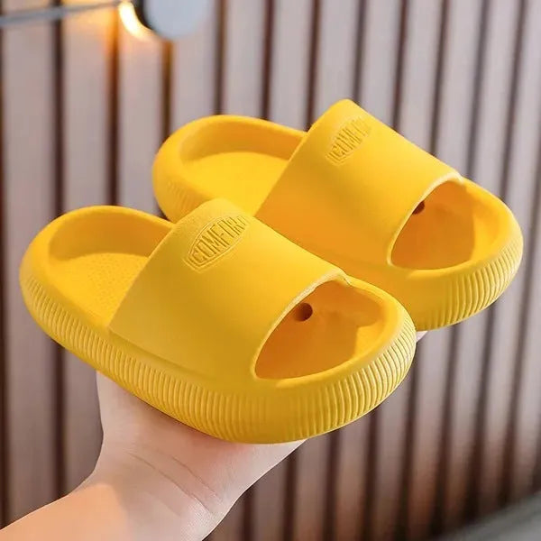 Children's EVA slippers in bright colours with non-slip soles, showing size options from 15.5cm to 21.5cm