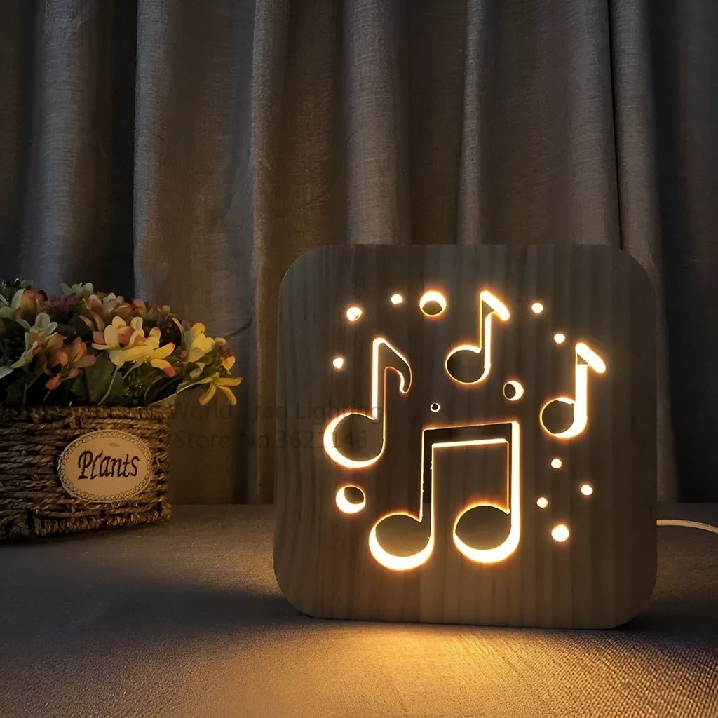Square wooden USB LED atmosphere light with laser-cut design glowing warm white.