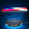 Round 5W wireless charger compatible with Floveme devices and iPhones in black ABS plastic
