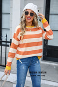 Women's loose-fitting floral patterned acrylic sweater in blue with round neck and long sleeves