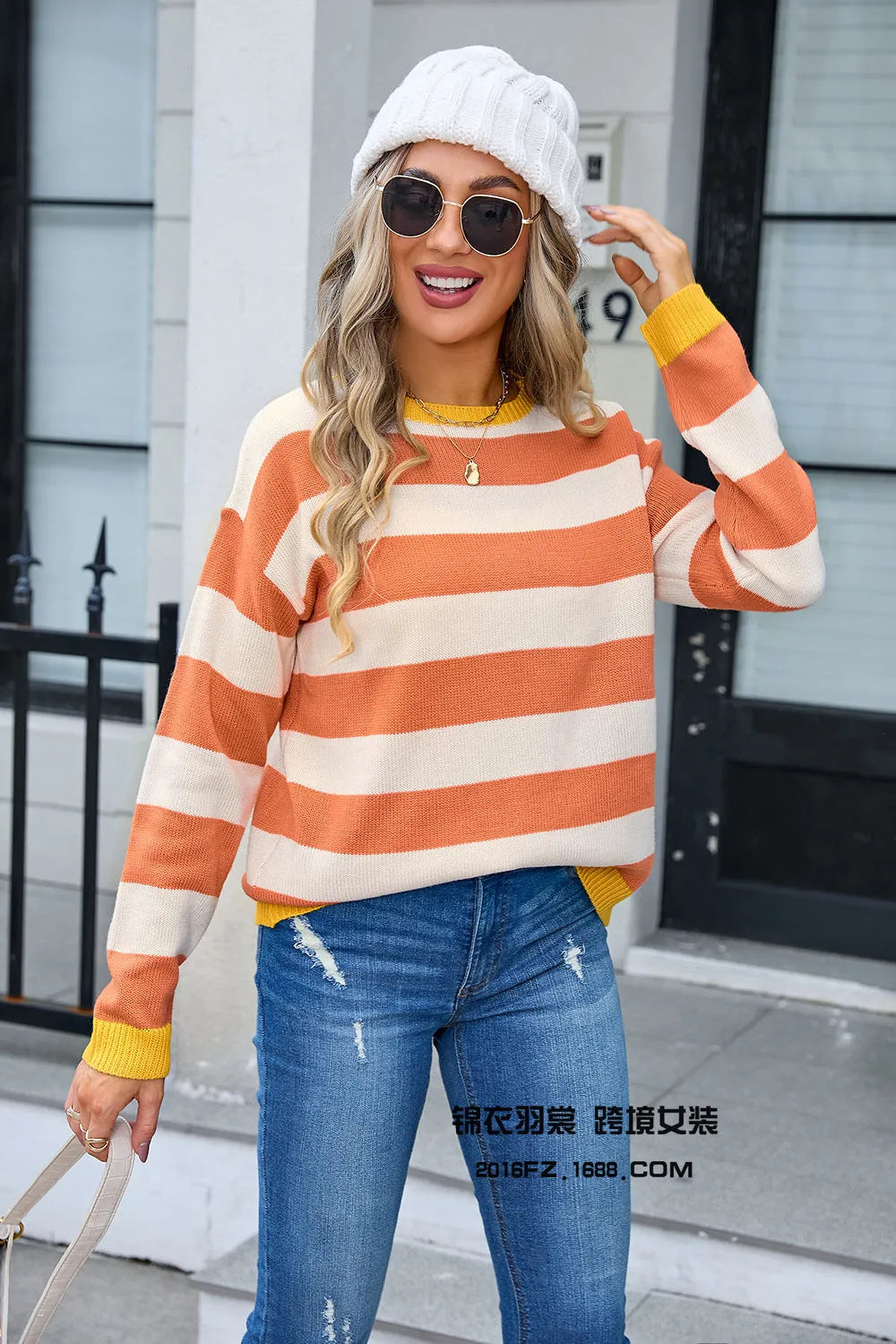Women's loose-fitting floral patterned acrylic sweater in blue with round neck and long sleeves