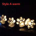 Black bear paw shaped solar garden lights set of four with central solar panel pole