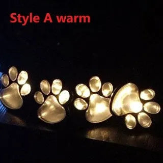 Black bear paw shaped solar garden lights set of four with central solar panel pole