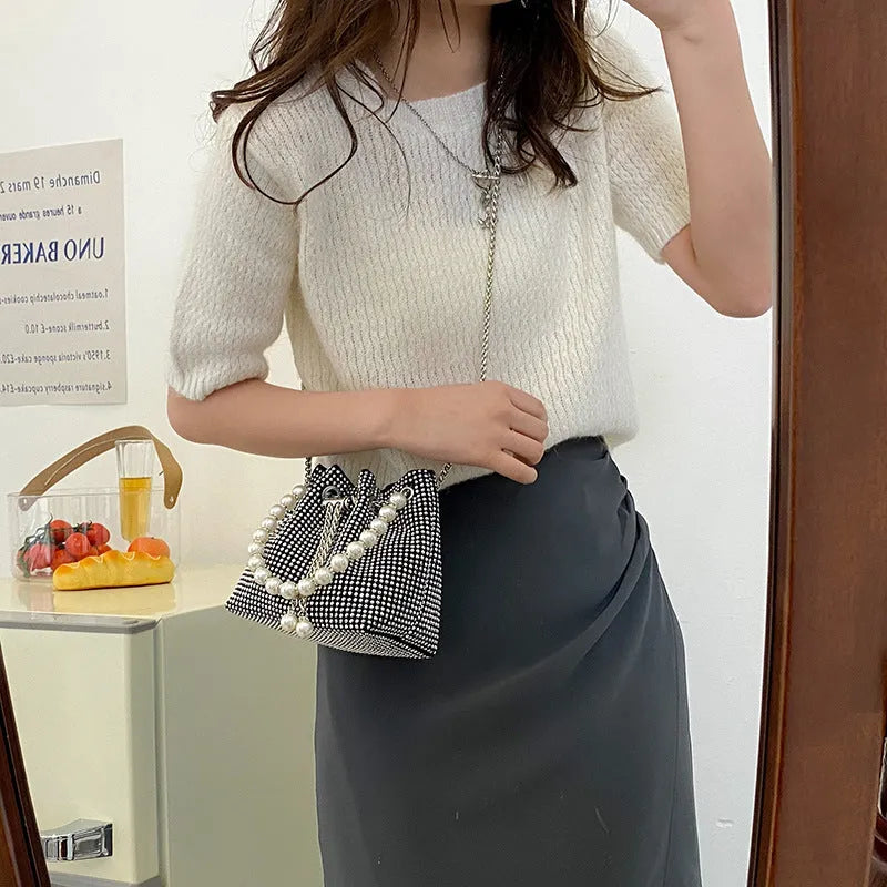 Soft PU leather crossbody bag with diamond embellishments and chain strap in bucket shape