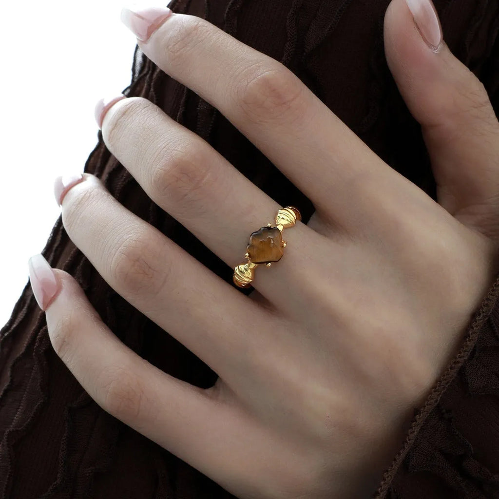 Women's adjustable silver ring with natural shell and tiger eye stone in cold-style design