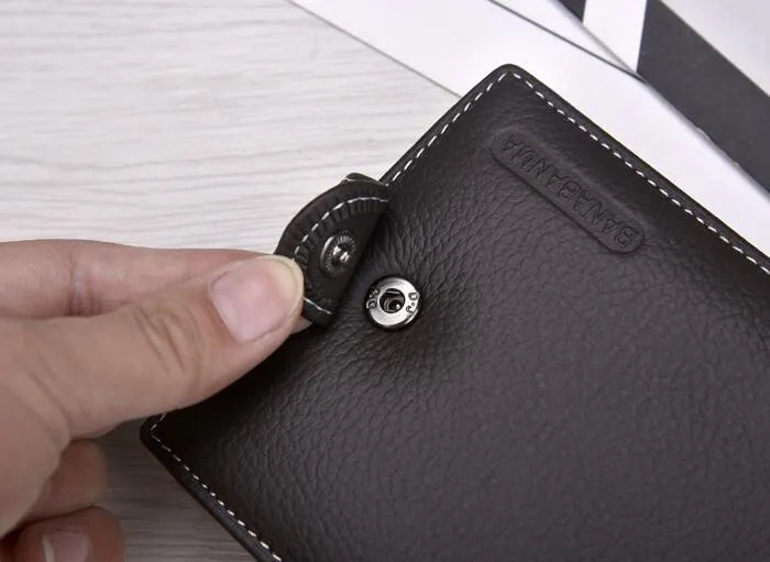 Men's genuine leather short standard wallet in black with compact dimensions, polyester lining