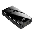 Large black or red 40000mAh power bank with LCD display screen showing battery percentage.