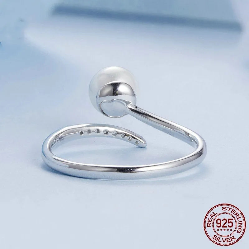 S925 sterling silver ring with shell pearls and open adjustable loop for size 8