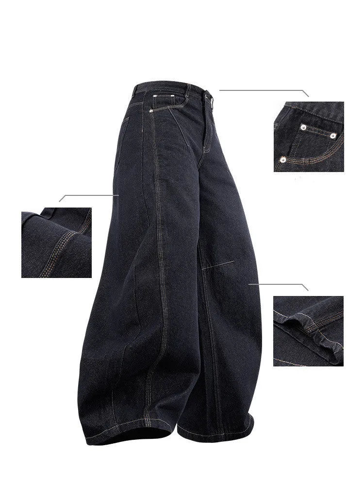 Men's wide leg denim trousers in original cow colour showing relaxed fit and mid waist construction