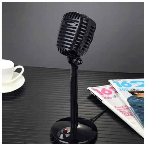 Black USB computer microphone on an adjustable ABS stand with a silicone foot pad.