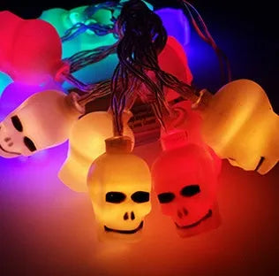 Halloween battery LED string lights showing bat, pumpkin, ghost and spider shapes on a 1.2 metre white wire.