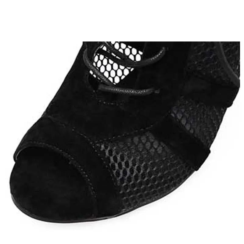 Black suede women's lace-up high heel shoe with ankle strap and 11.5cm heel.