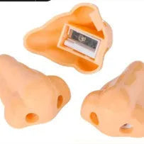 Flesh colour plastic manual pencil sharpener with geometry shape measuring 58x45x30mm for student stationery